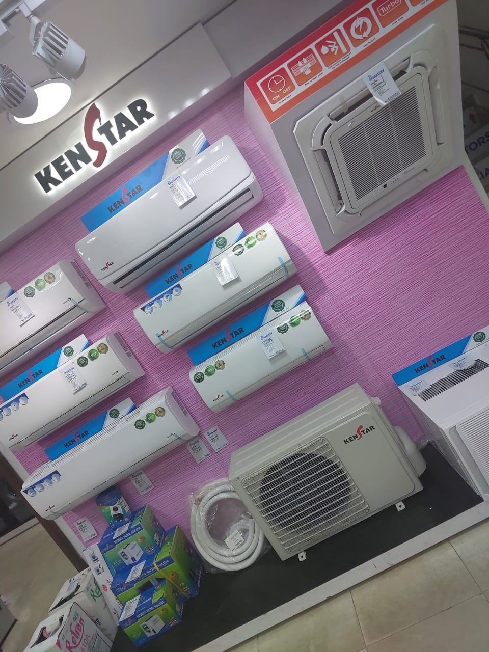 Kenstar split and cassette air conditioners on the showroom wall