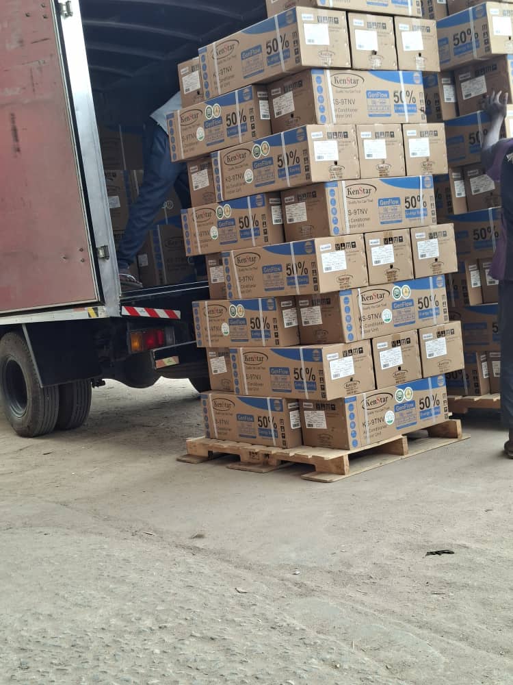 Air conditioning units being offloaded for delivery